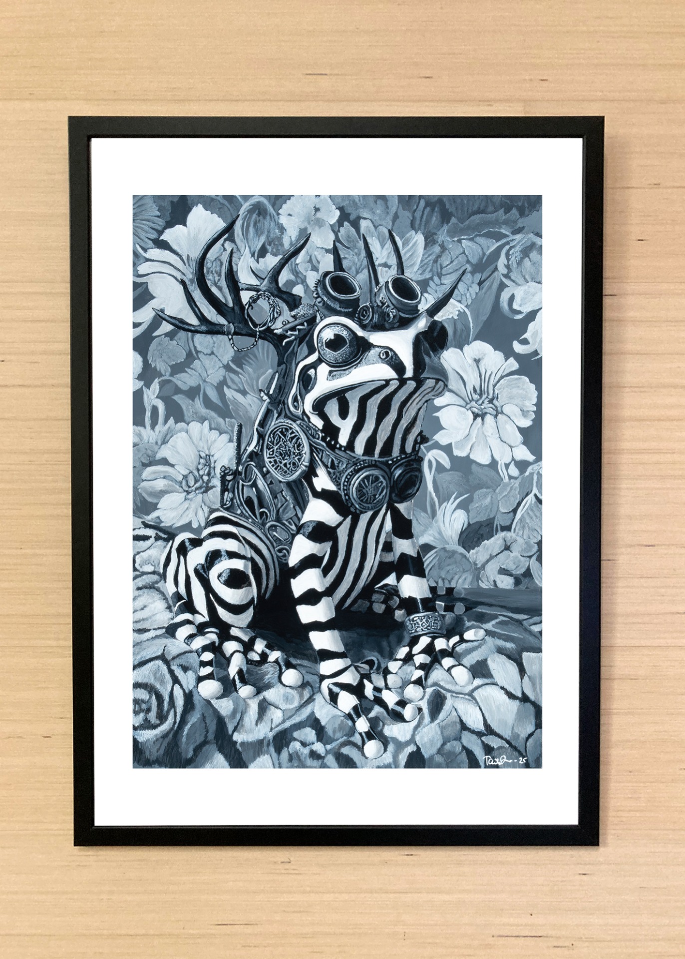 Imagiarium-juliste Tuure, jossa mustavalkoinen sammakkohahmo yhdistyy mekaanisiin ja orgaanisiin yksityiskohtiin.